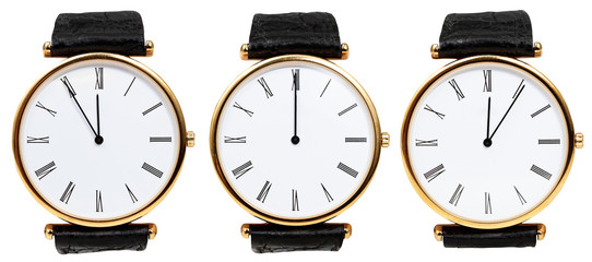 set of wristwatches with midnight time