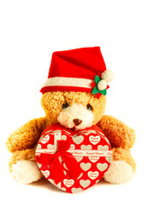 Teddy bear wearing a santa hat.