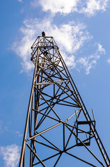 Geodetic point in Russia against blue sky background
