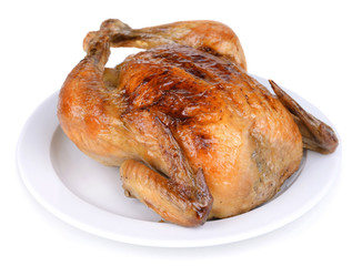 Delicious baked chicken on plate isolated on white