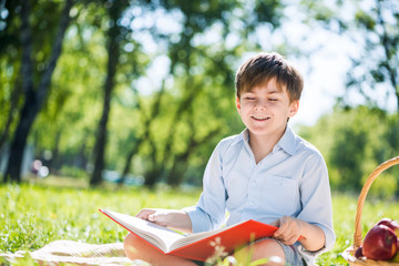 Boy in summer park