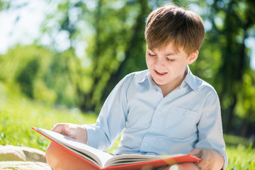 Boy in summer park