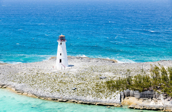 White Lighthouse on Rocky Beach