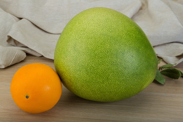 Green pomelo and orange