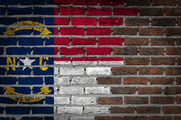 Brick wall texture with flag