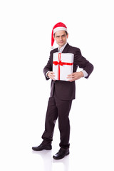 man in suit and hat with Christmas gift hand on white backgro