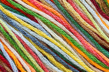 Multicolor sewing threads texture. Diagonal. - 73608842