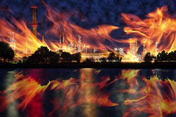 Fire at oil refining plant - abstract view.