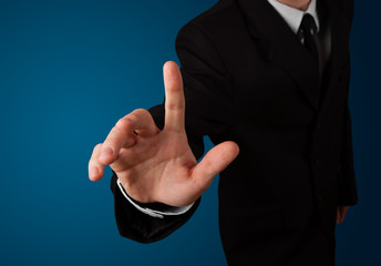 Businessman pressing imaginary button