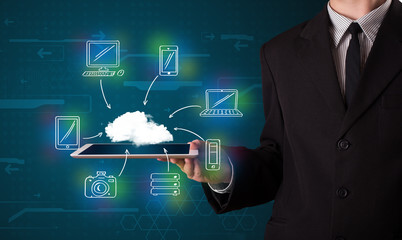 Businessman showing hand drawn cloud computing
