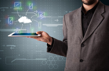 Businessman showing hand drawn cloud computing