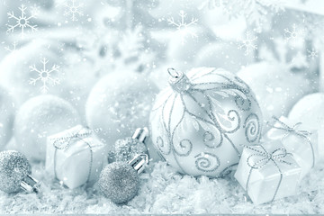 Fototapeta na wymiar Christmas ornaments on snow