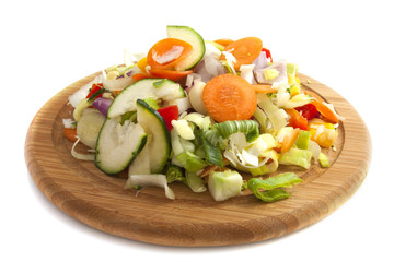 Sliced vegetables on wood