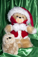 doll with hat of santa claus and gifts