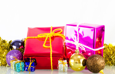 Gift box and christmas ball on white background