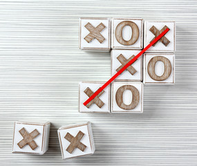 Game of Tic Tac Toe on wooden background