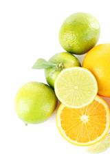 Fresh juicy limes and oranges isolated on white