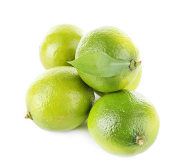 Fresh juicy limes isolated on white