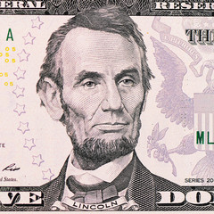 The face Lincoln the dollar bill