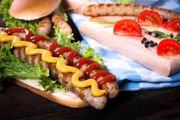 Ketchup and mustard on sausages