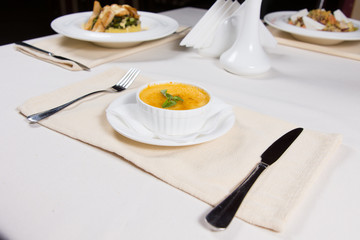 Bowl of tasty seasonal autumn butternut soup
