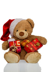Teddybär mit Weihnachtsgeschenken