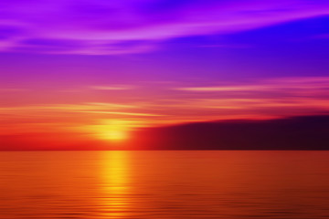Naklejka na ściany i meble Blurred sunset in purple color