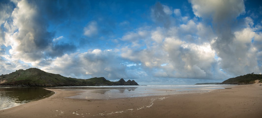 Beautiful Summer sunrise landscape over yellow sandy beach
