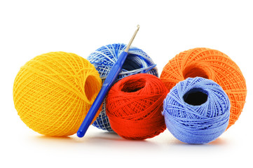 Colorful yarn for crocheting and hook isolated on white