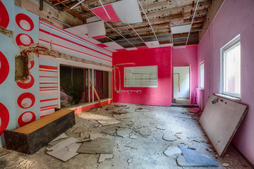 Demolished room with pink walls