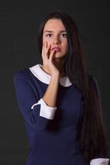 Portrait of a surprised beautiful young woman