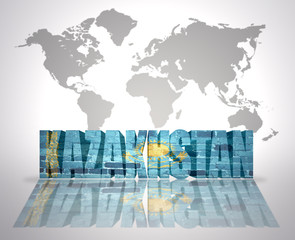 Word Kazakhstan on a world map background
