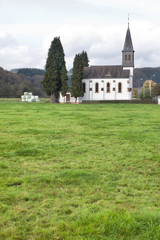 church and green field