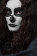 Girl make up a skull