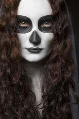 Girl make up a skull