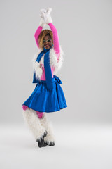 Festive african woman wearing funny costume posing