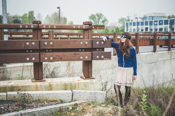 beautiful woman in a desolate landscape