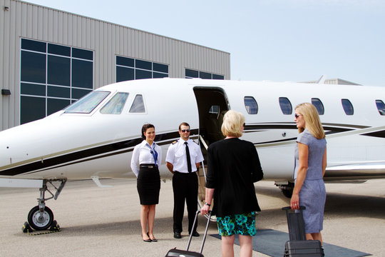 Passengers about to board jet