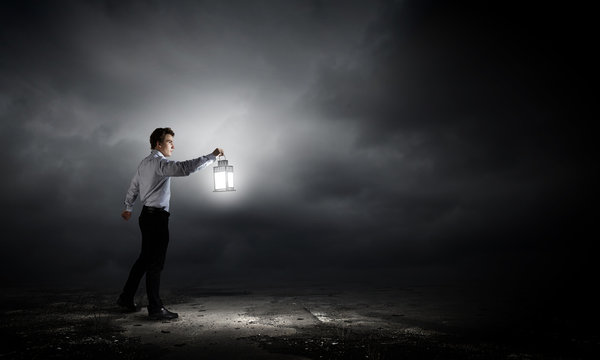 Man with lantern