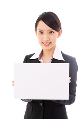 asian businesswoman holding blank whiteboard