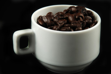 Coffee beans and cup