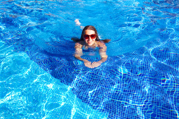Beautiful woman in pool