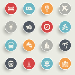 Travel icons with color buttons on gray background.
