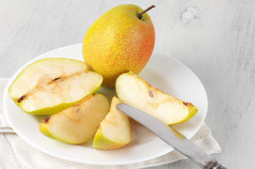 Pears on white plate
