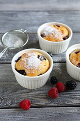 Delicious cupcake with raspberries