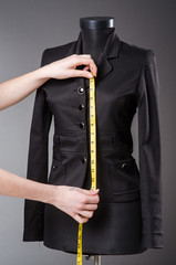 Woman tailor working on new dress