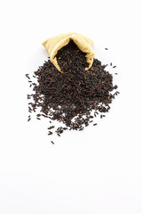 Rice berry in small burlap sack .