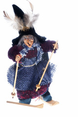 epiphany witch with skis on a white background