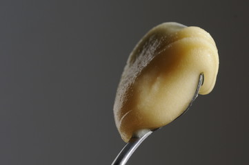 spoon with pasty honey