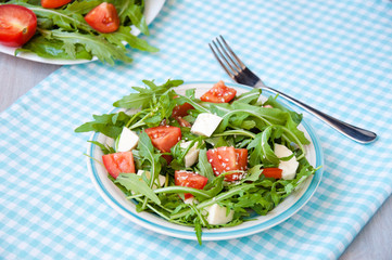 Greece salad with mozzarella, ruccola and tomatoes